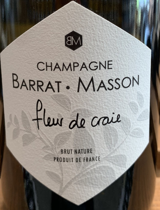 Rücketikett der Champagnerflasche Barrat-Masson Fleur de Craie, zeigt Details zur Herstellung, Bio-Zertifizierung und Alkoholgehalt.