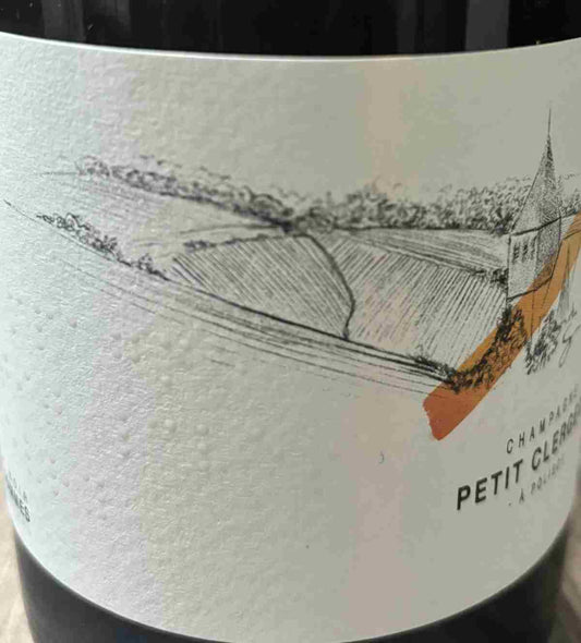 Flasche Champagner Petit Clergeot Les Commes Brut Nature, die die sorgfältige Herstellung und Qualität aus Polisot zeigt.